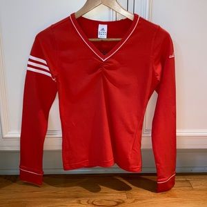Women’s NWT orange Adidas sport top.